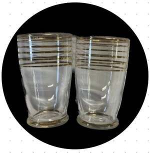 Set of 2 Anchor Hocking juice glasses with gold stripes